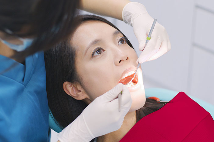 تحجيم الأسنان ، كيف هي الإجراءات والفوائد؟